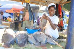 Fisherwoman at the fish selling joint.