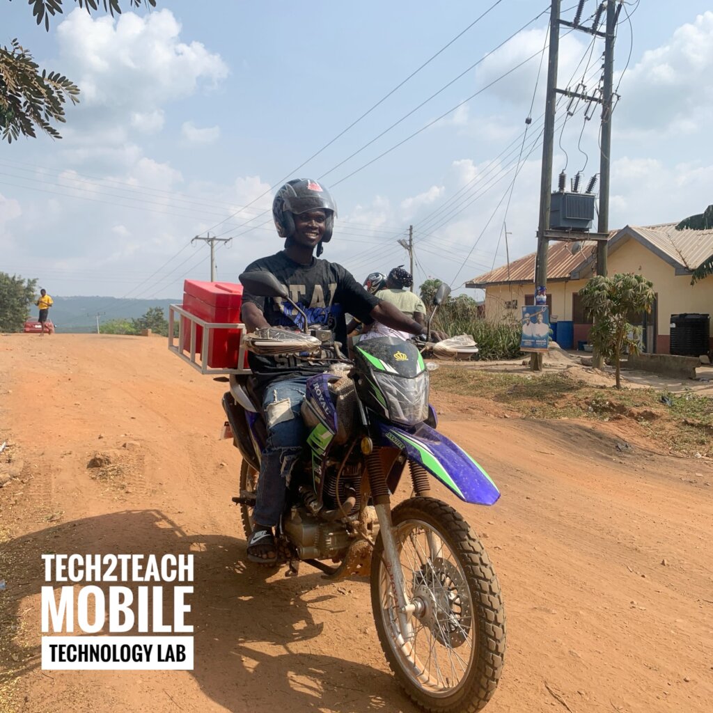 Motorbike transporting tablets to rural schools