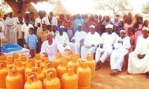 Community Members Receive Micro-credit Purchases