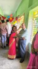 Alindra receiving a bindi by one of the dancers