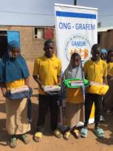 Displaced children receive school kits