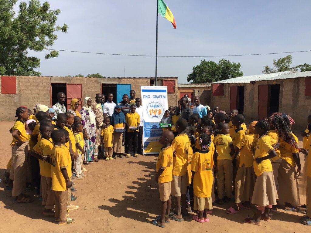 Students + teachers from the school for displaced