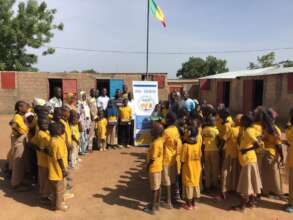 Students + teachers from the school for displaced