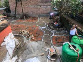 Working on landscaping the garden