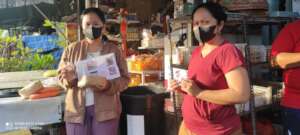A single mother running a small roadside stall.