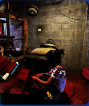 Solar lighting allows working her loom at night