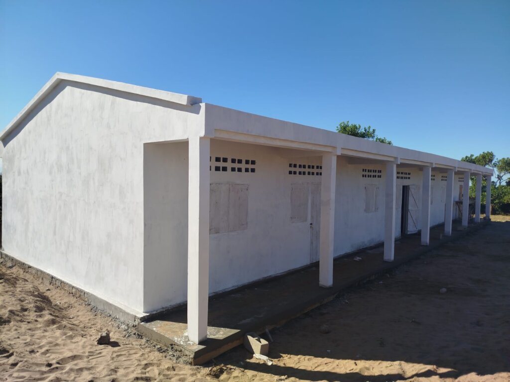 Adding the finishing touches to Karinoro building