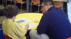 School on Wheels Tutor and Student