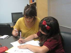 Tutor and Student busy at work