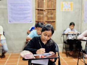 Students quietly taking exams.