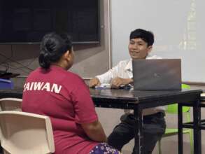 Teacher having a meeting with a parent.