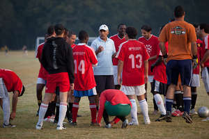 Coach Hassan talking to the team