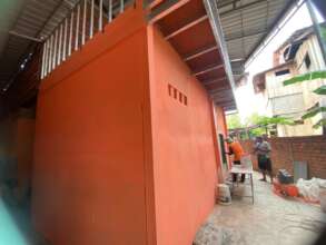 The roof behind the school building