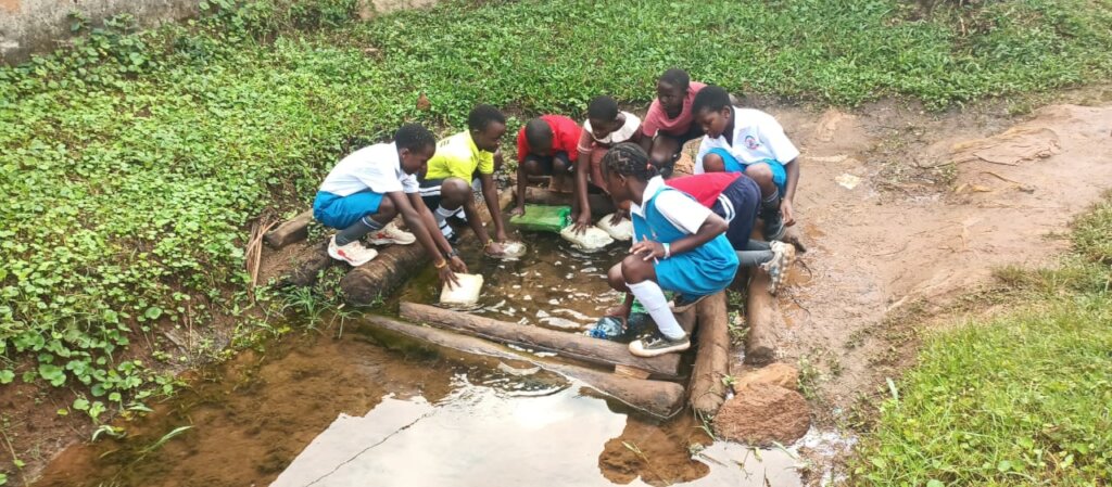 school children at water source