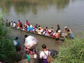 Refugees arrive by boat in Thailand