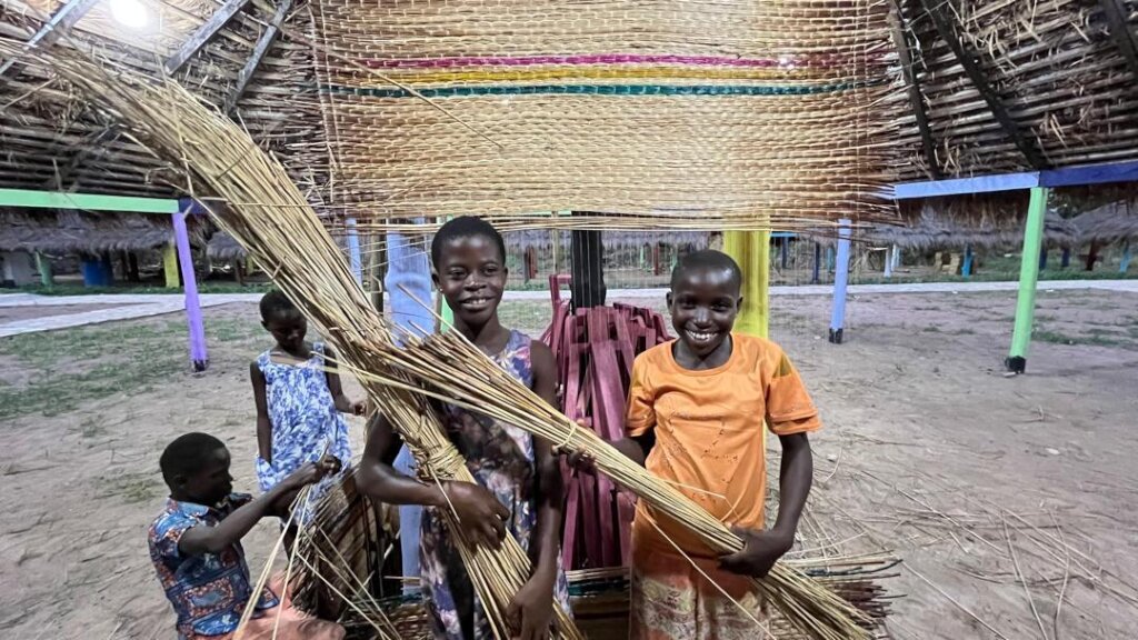 Students learning Sleeping Mat weaving