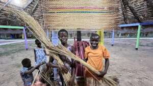 Students learning Sleeping Mat weaving