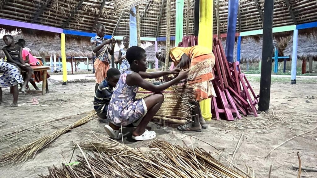 Students learning Sleeping Mat weaving