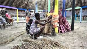 Students learning Sleeping Mat weaving