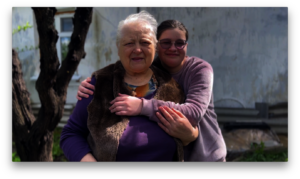 Family: elderly woman and orphaned child