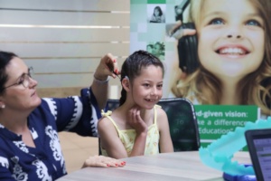 Qiana receives her hearing device