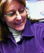 Susan works on financials with the help of Brownie