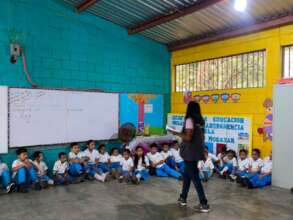 Youth facilitator Jessica leading an activity