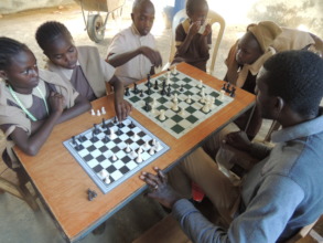 Children being taught chess