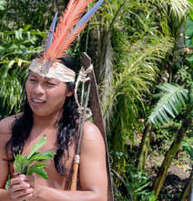 Elias in typical Maleku dress (made from trees)