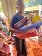 Man in Mandalay receives emergency supplies