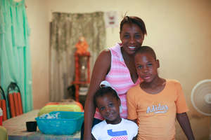 Artisan Minouche at home with her children