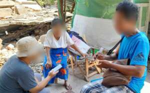 AAR's local staff member interviewing a survivor