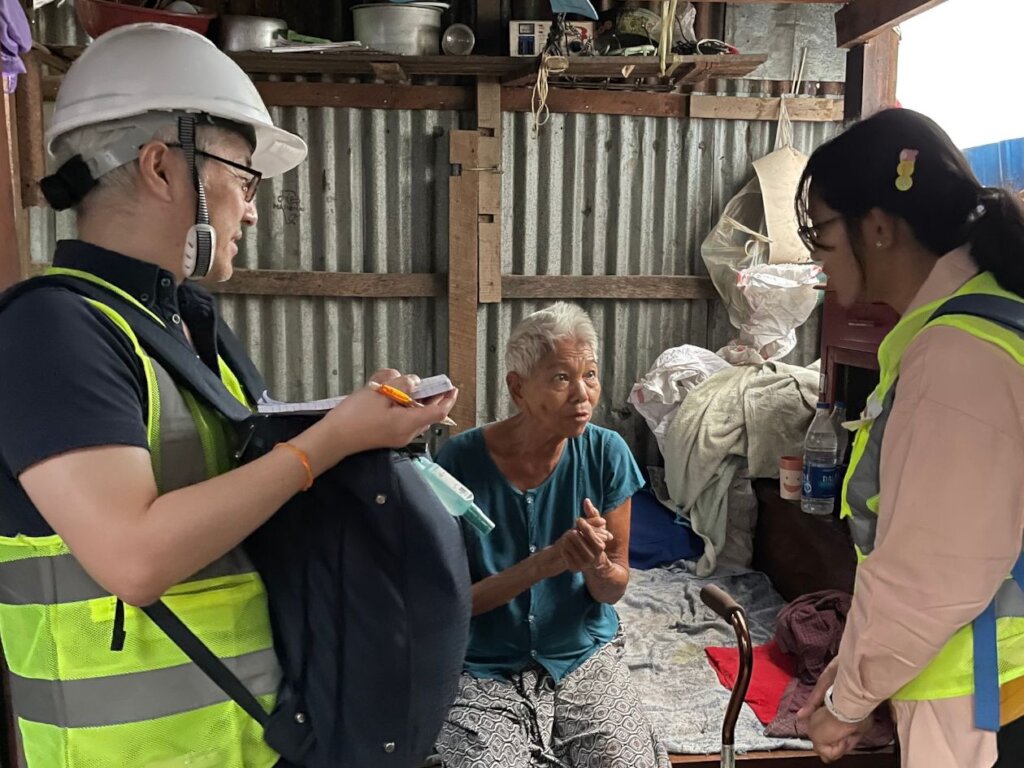AAR staff member listening to a survivor