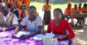 Volunteer adjudicators seated during a preliminary