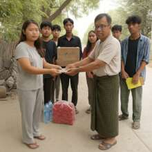 Distributing funds to local partners in Sagaing.