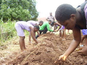 Girls planting their crops