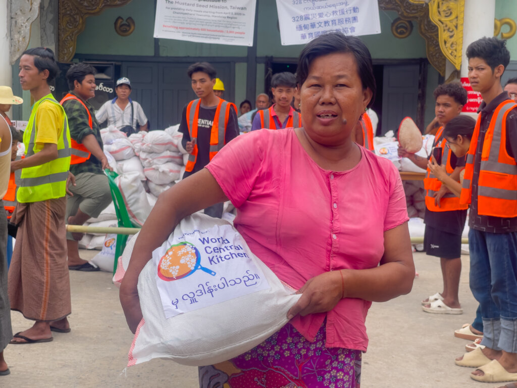 Local residents collecting WCK Food Kits