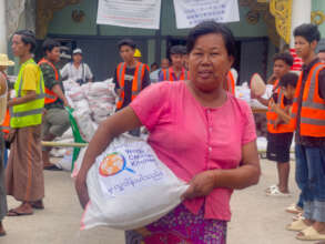 Local residents collecting WCK Food Kits