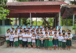 A year group in their new school uniforms