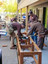 Volunteers beautify patio for Veteran shelter