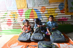 Taking a sneak peak at their new school supplies