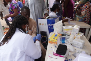 Dr. Ruth prescribing medicine during outreach