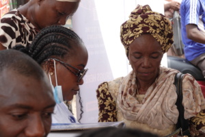 Elderly woman receiving medical care from EMCR