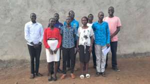 Participants pose for a photo after a workshop
