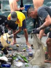 Cleaning the ocean with Diskoncept in Taganga town