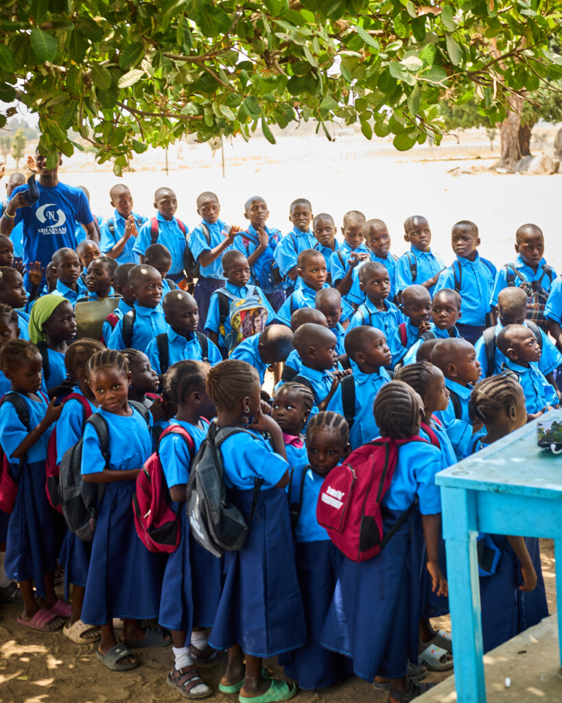 Students standing outside the school