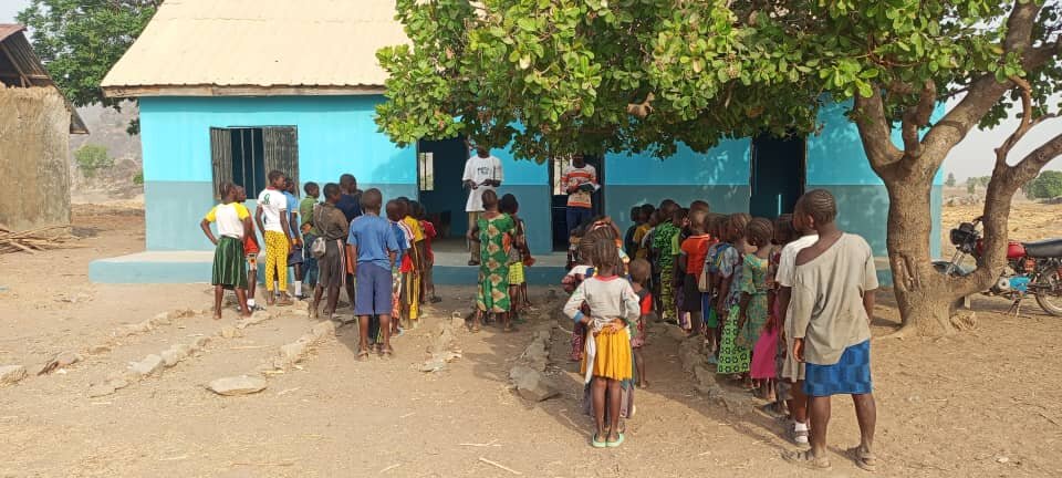 Some of the students standing outside the school