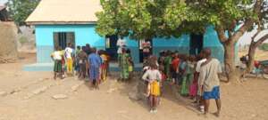 Some of the students standing outside the school