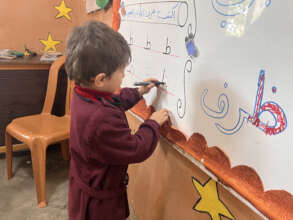 A student learning Arabic in the kindergarten