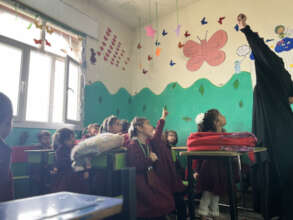 Teacher leading a classroom activity